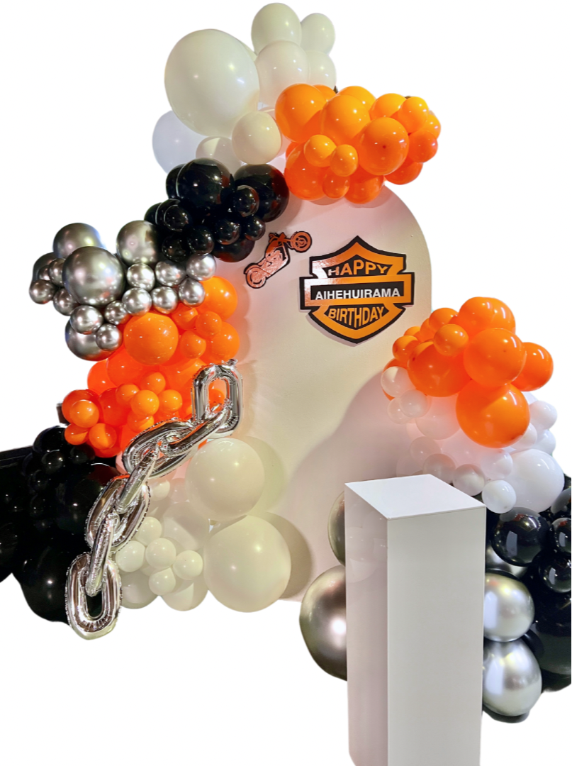 Harley Davidson themed balloon backdrop and cake plinth