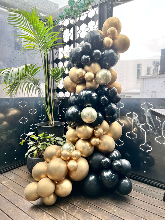 Black and gold balloon garland grab and go on stand 3m