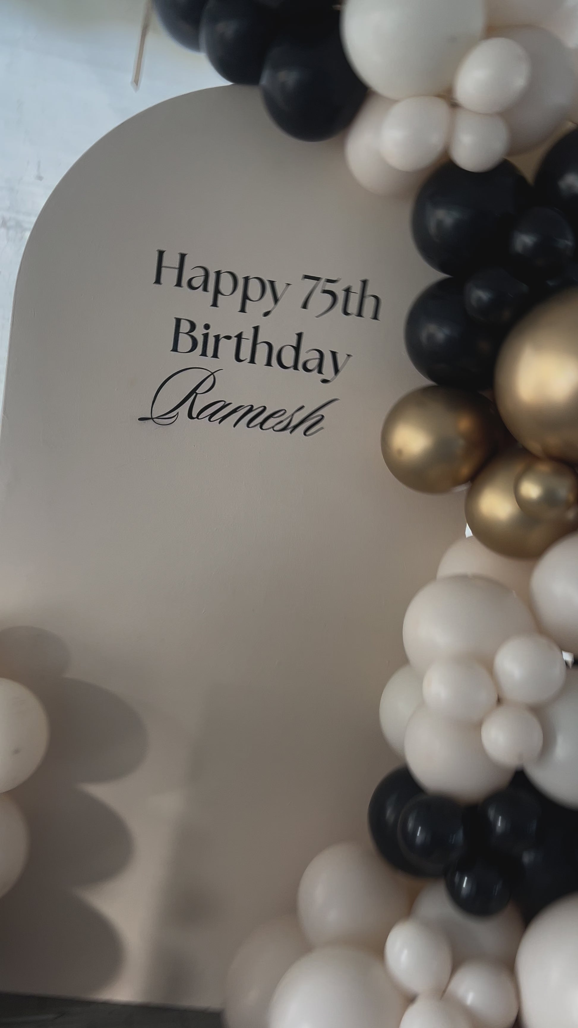 Birthday backdrop with black/sand/gold balloon garland Auckland 